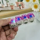 4-Button Fingertip Keyboard Keychain RGB Keyboard Fidget Toy with Lights For Stress Relief.
